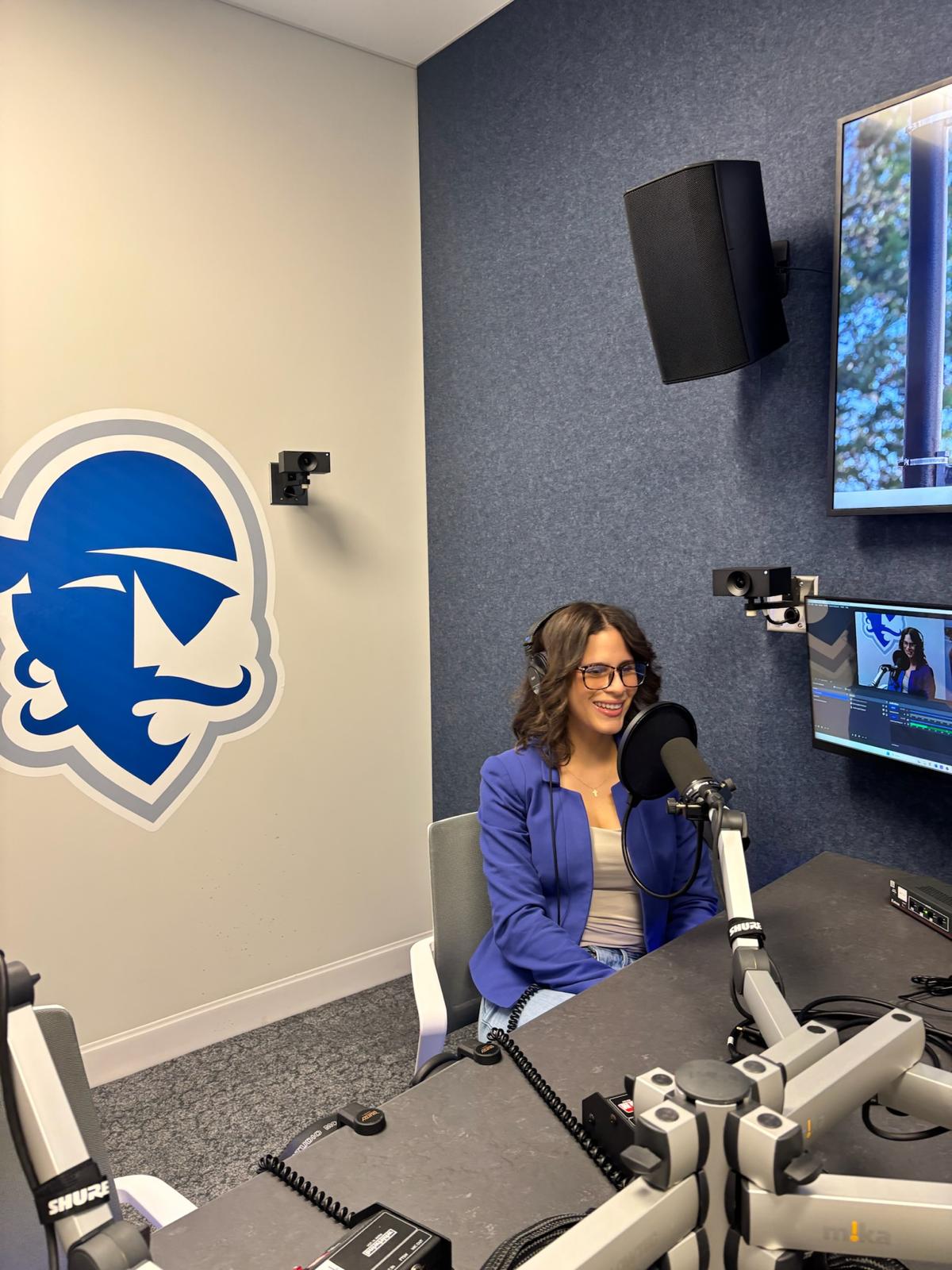 Jazzlyn recording solo at the Seton Hall podcast studio